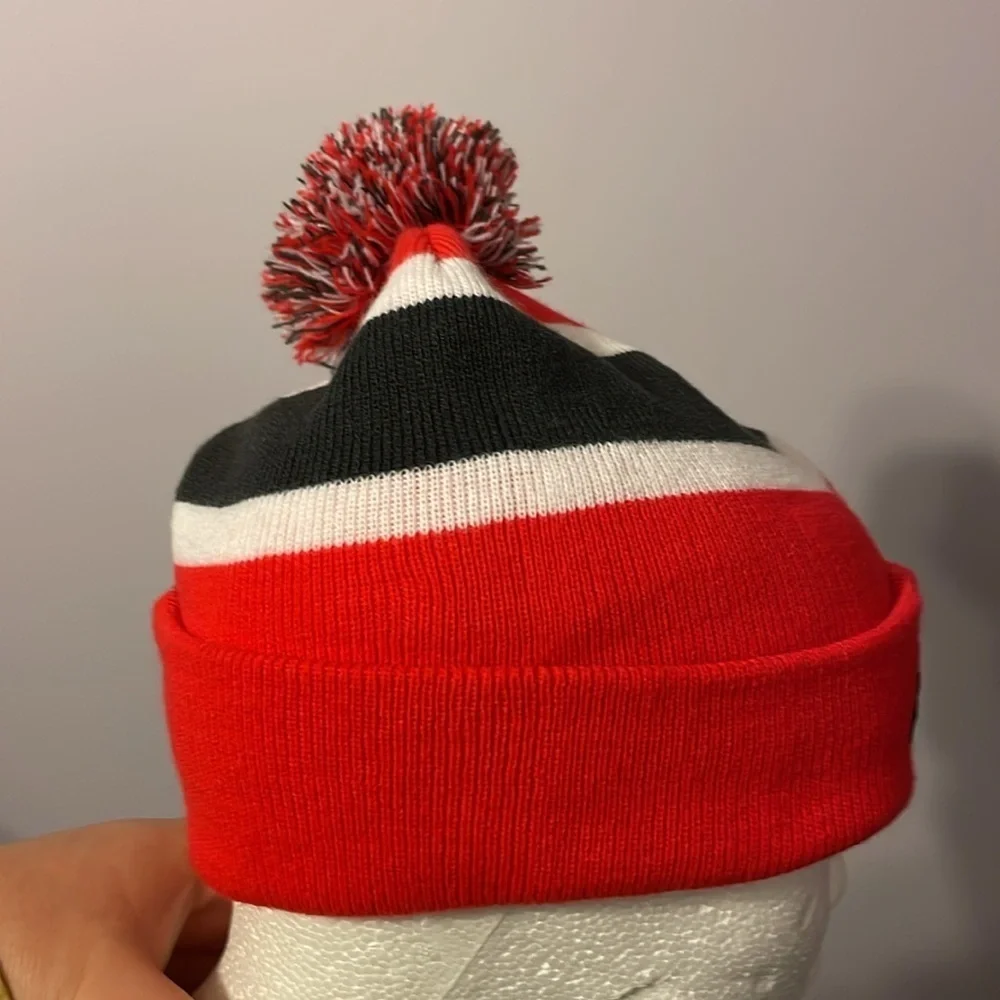 NFL Team Apparel Tampa Bay Buccaneers Knit Beanie Hat with Pom Pom Striped OS